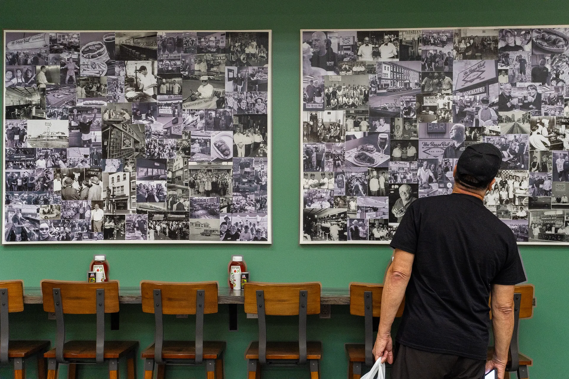 the brass rail restaurant wall full of history photos