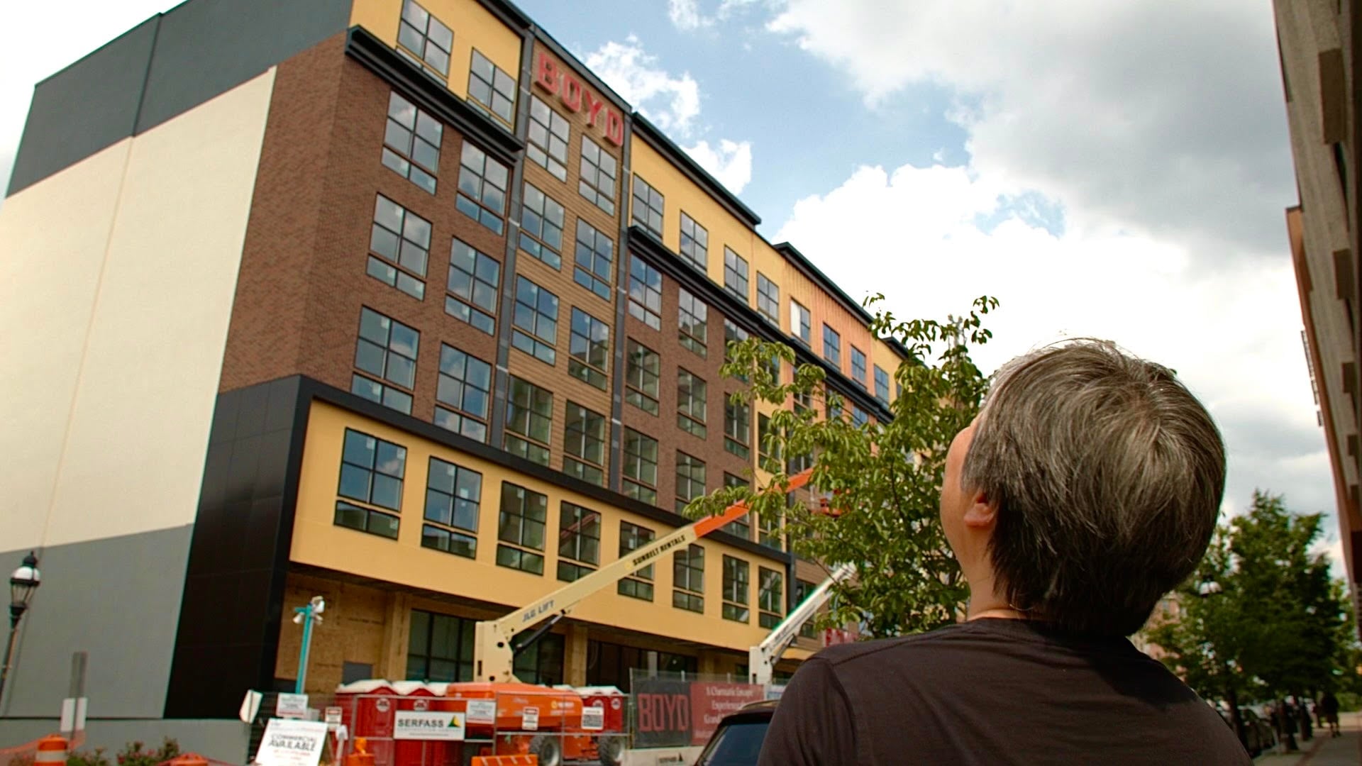 lan ma looks at future site of paris baguette in bethlehem pa at the new boyd apartment buildings