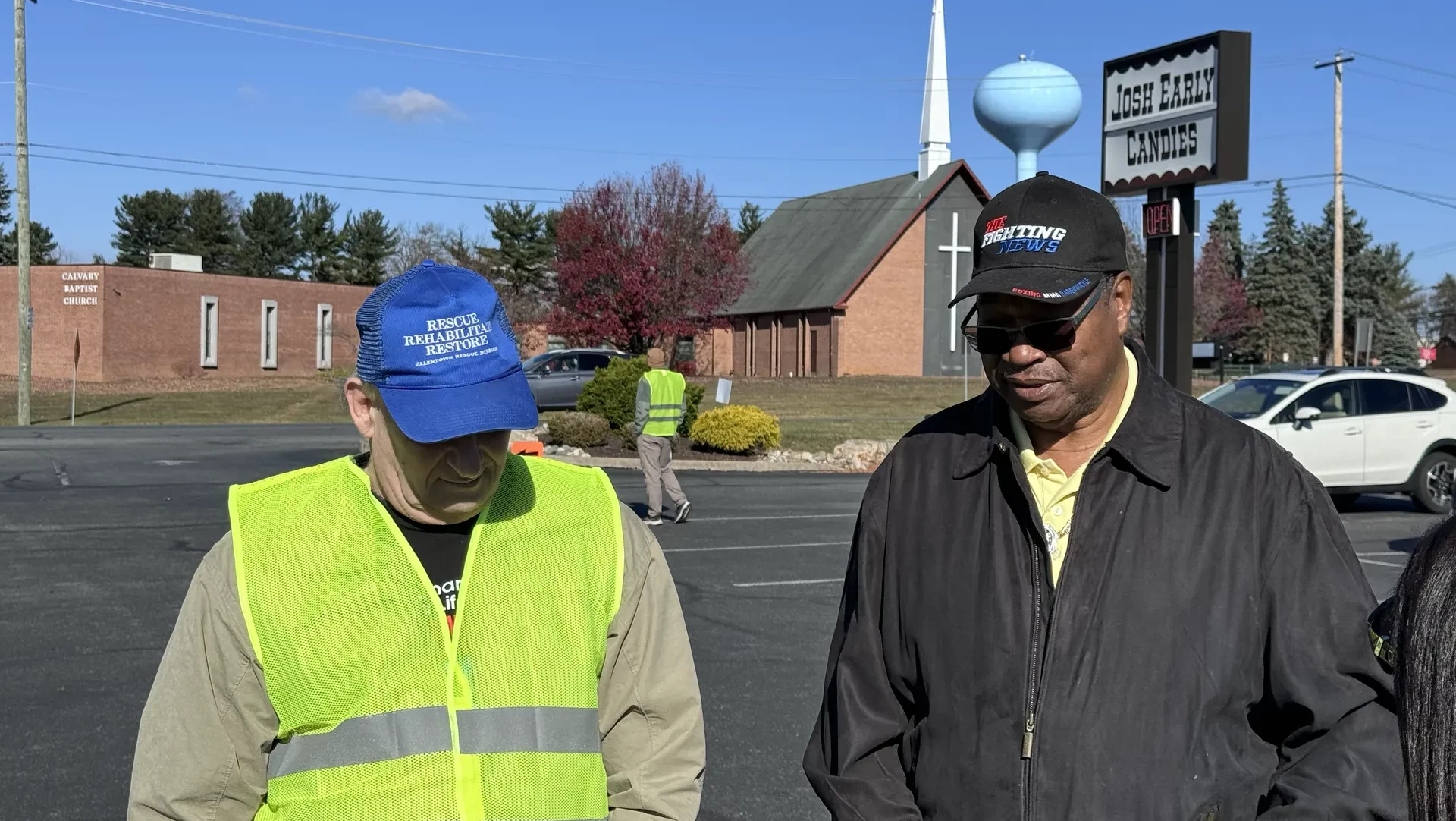 Allentown Rescue Mission CEO Skip Smith w/ Boxing Champ Larry Holmes at Josh Early Candies in Allentown, Pa