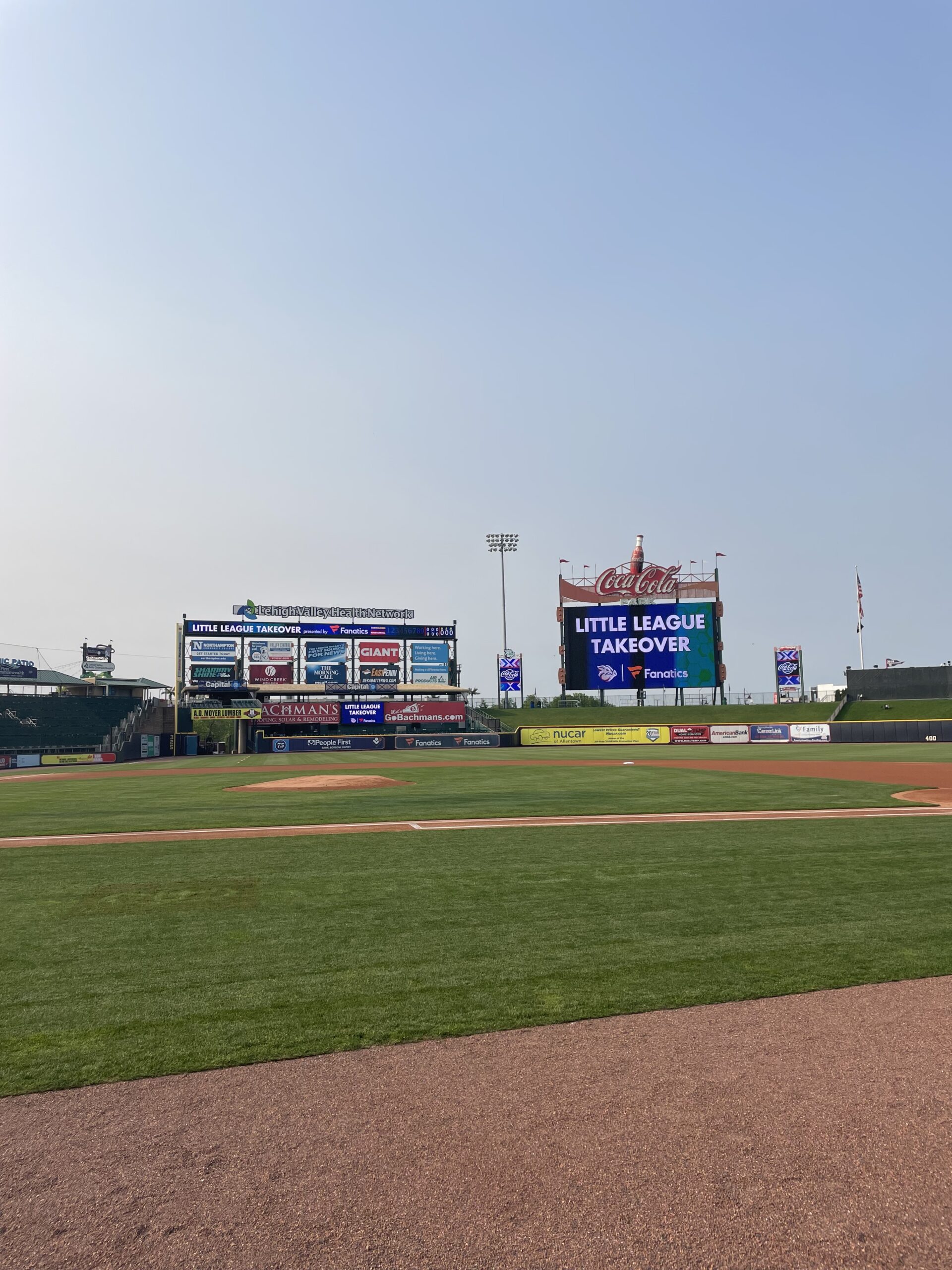 coca-cola ballpark with little league takeover sign