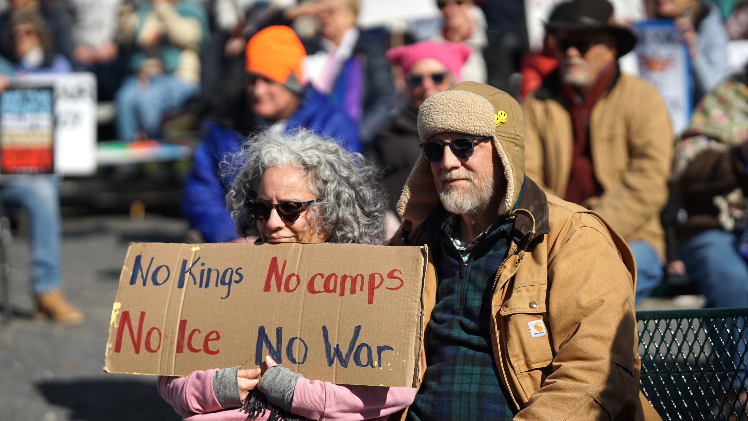 couple with sign protest bethlehem rose garden mar 28 2026