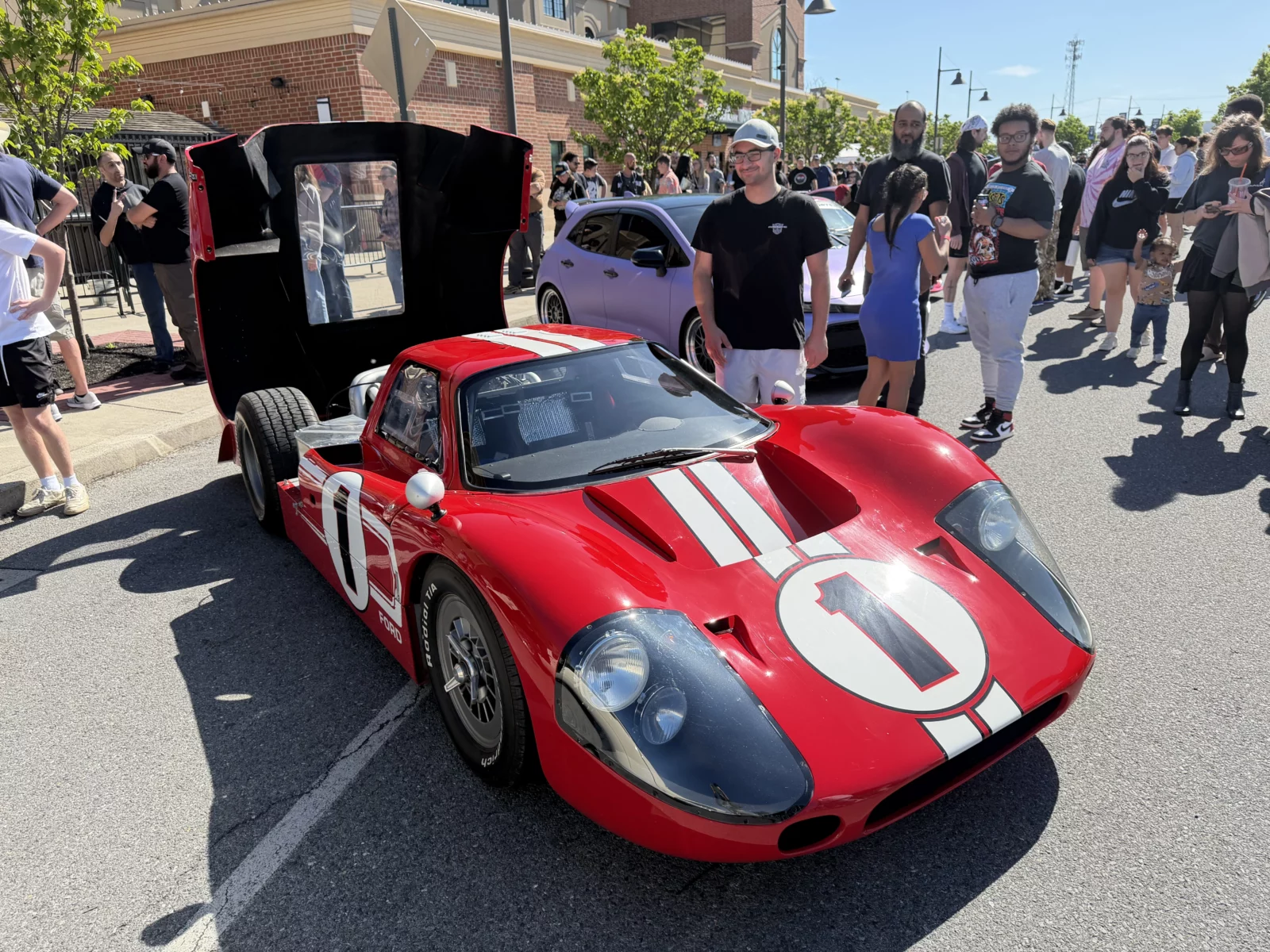 A red Ford GT40 Mk IV-style race car marked No. 1.