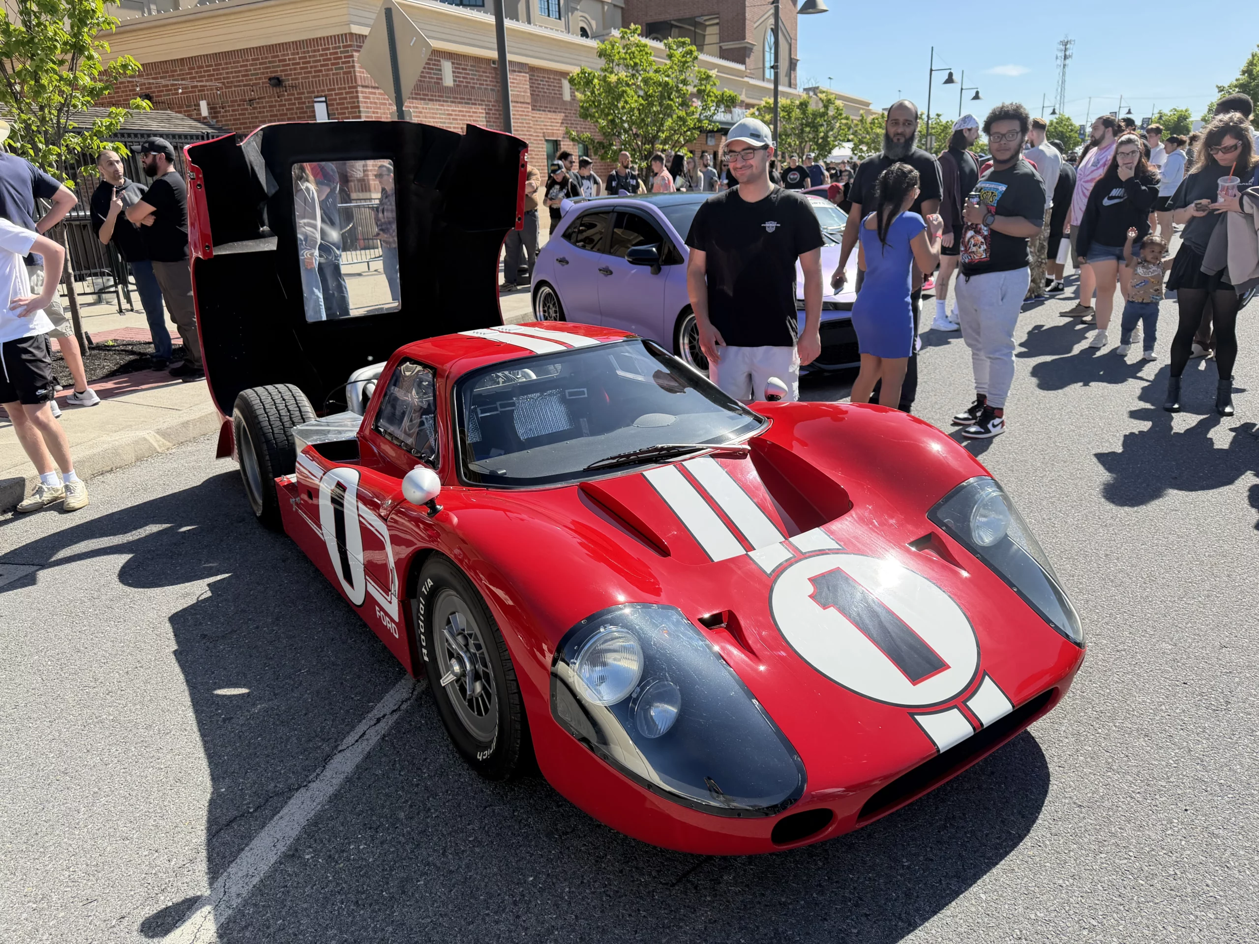A red Ford GT40 Mk IV-style race car marked No. 1.
