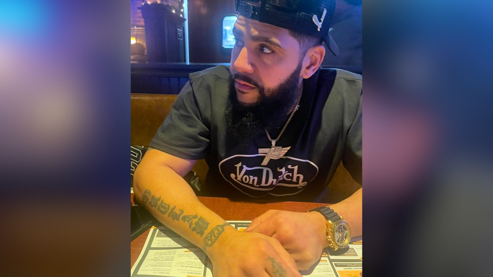 Carlos Figueroa, whom Bethlehem police say is wanted in connection with a June 3 domestic violence incident, seated at a table.