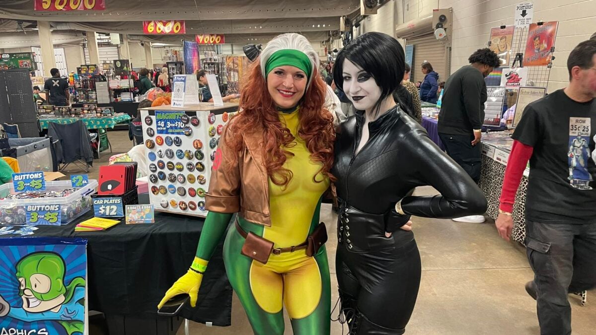 Two cosplayers pose together on the vendor floor during the Lehigh Valley Comic Convention.