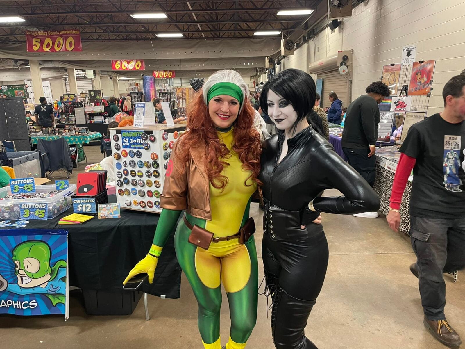 Two cosplayers pose together on the vendor floor during the Lehigh Valley Comic Convention.